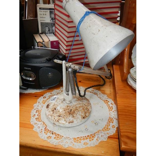 175 - A mid 20th century adjustable lamp.