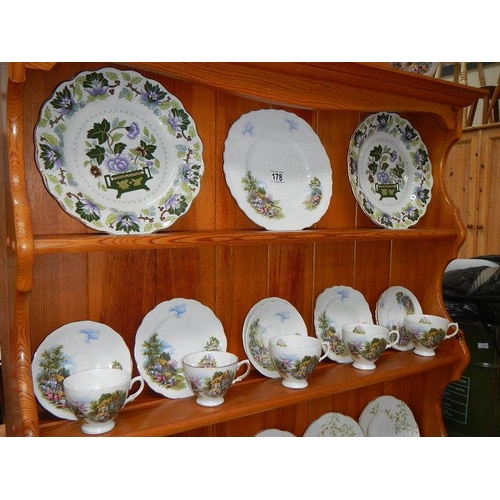 178 - An 18 piece tea set and 2 Booth's plates.