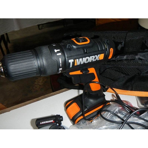 183 - 2 new Worx tools - floor board cutter and electric drill.