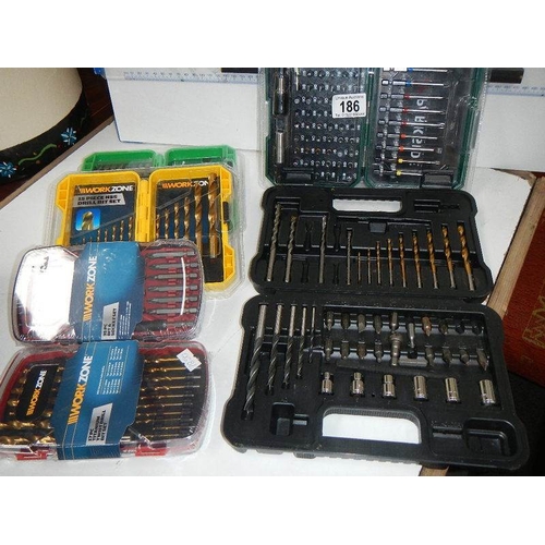 186 - 5 boxes of new drills etc.,