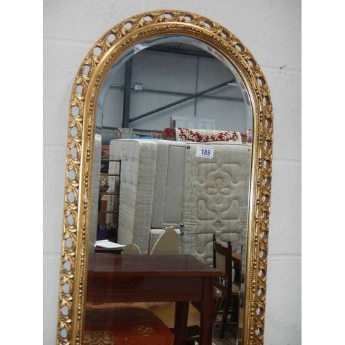 188 - A good oval top bevel edged mirror and one other.