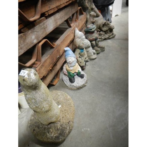 276 - 6 Garden gnomes and a quantity of ceramic garden pots.