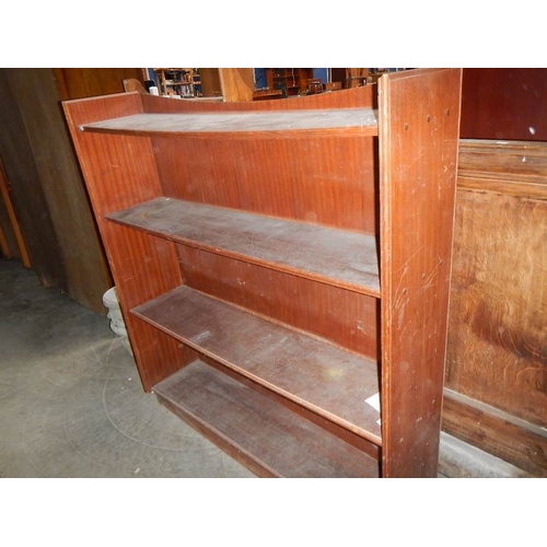 281 - A mahogany veneered 4 shelf open book case.