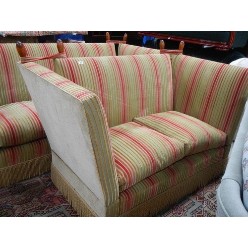 284 - A 2 seater French knoll end sofa.