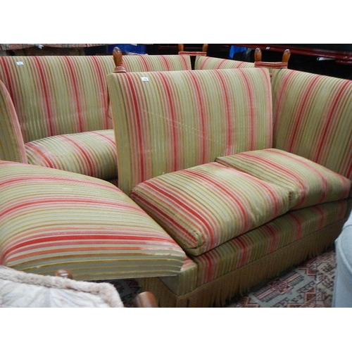 284 - A 2 seater French knoll end sofa.