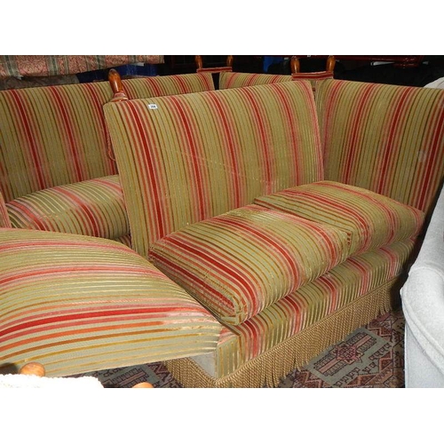 284 - A 2 seater French knoll end sofa.