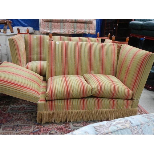 284 - A 2 seater French knoll end sofa.