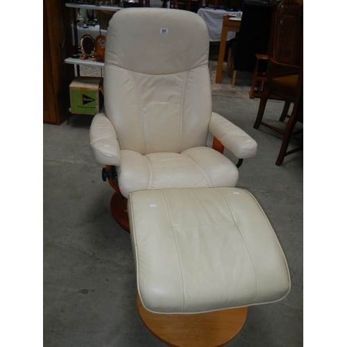 291 - A good cream leather chair with stool.