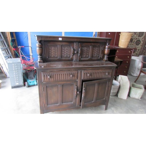 297 - An oak buffet sideboard.