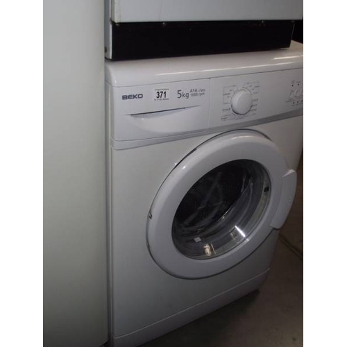 371 - A Beko A + A class washing machine (5 kg max load).