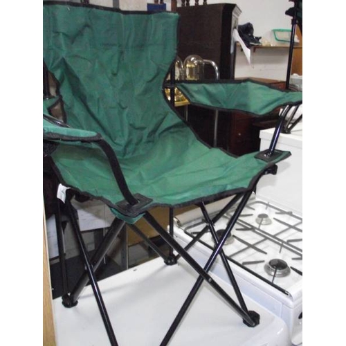 372 - 7 folding camping chairs (5 with covers).