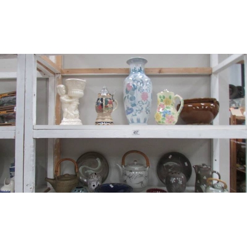 457 - 2 shelves of pottery items including Studio Pottery, vases etc