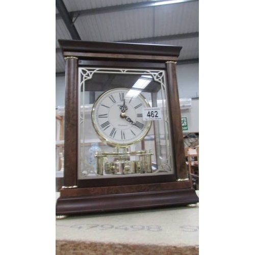 462 - A rhythm Westminster battery bracket mahogany cased mantle clock