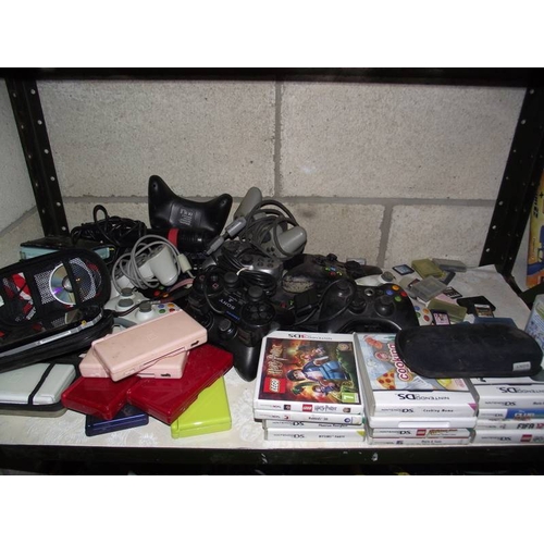 453 - A huge quantity of Xbox 360, Playstation, Wii, Nintendo's including games (sold as seen), a huge amo... 