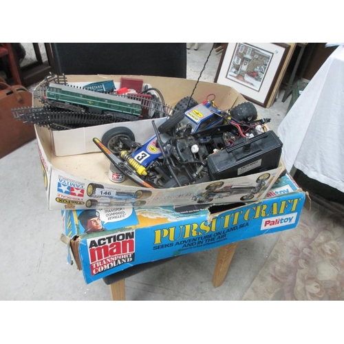 146 - A quabtity of remote control cars, spares etc, railway items and a boxed Action Man Pursuit Craft