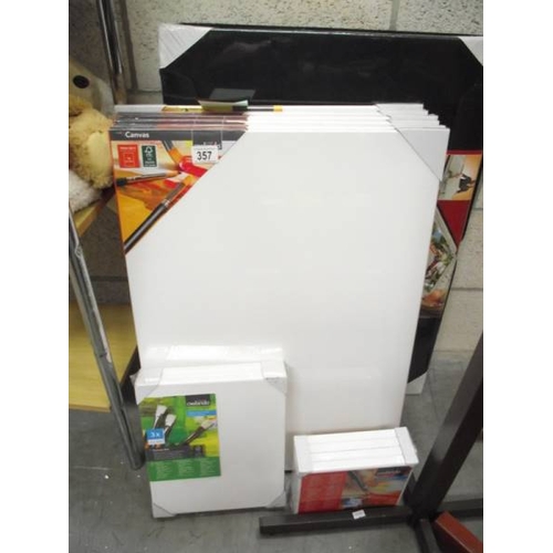 357 - A quantity of new canvas on wooden frames, puzzlemate etc.,