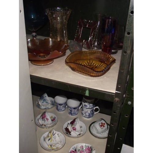 335 - 2 shelves of art glass, cups & saucers etc.,