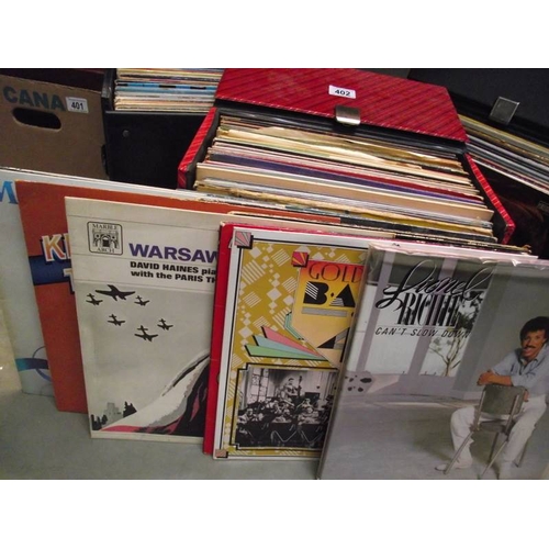 402 - 3 boxes of LP records, a mixture, including Lionel Ritchie, Gladys Knight, Big Bands (no condition r... 