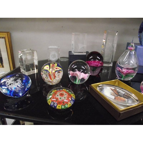 421 - A good lot of glass paperweights etc.