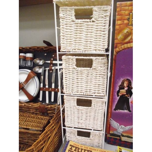 450A - A picnic basket with contents and a 4 drawer wicker chest.