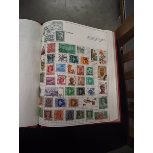 489 - A box of stamp albums with stamps.