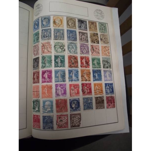 489 - A box of stamp albums with stamps.