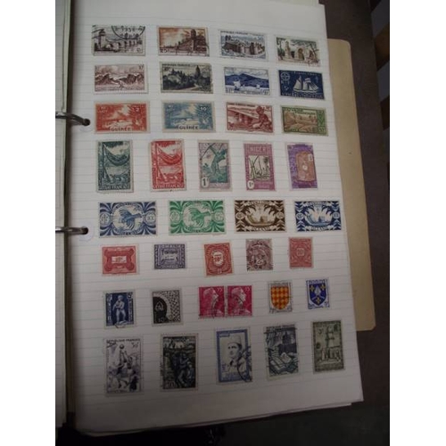 489 - A box of stamp albums with stamps.