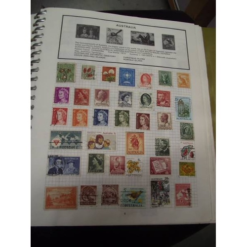 489 - A box of stamp albums with stamps.