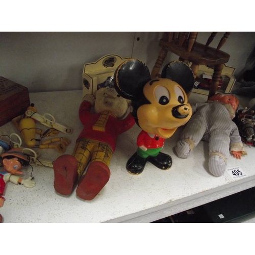 495 - A mixed lot of modern and vintage toys including Mickey Mouse, Rupert the bear, Andy Pandy etc.,