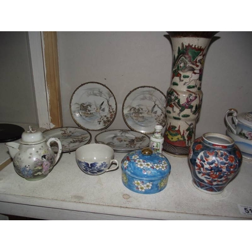 517 - A mixed lot of oriental china including vases, plates etc.,