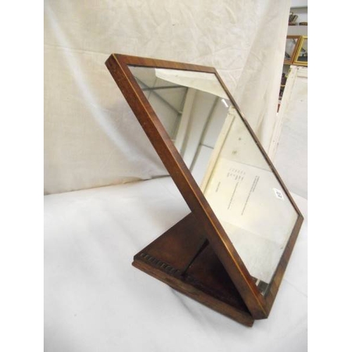 523 - A Victorian mahogany table mirror.