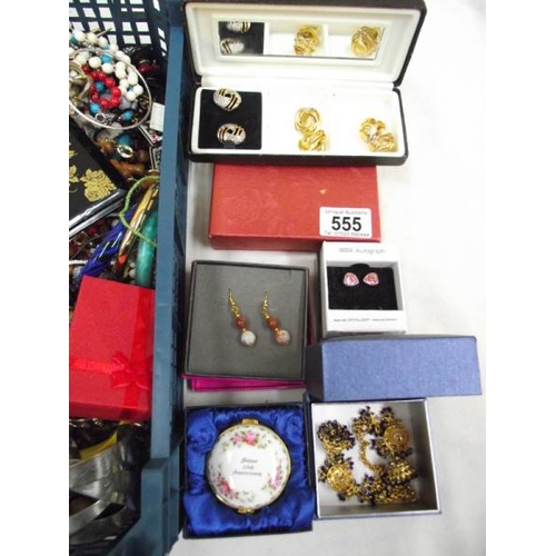 555 - A mixed lot of costume jewellery, some boxed, some vintage etc.,