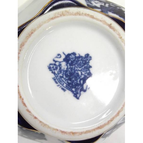 566 - A blue and white Staffordshire pottery biscuit barrel with silver plate fittings.