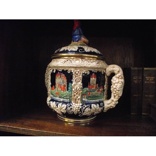 595 - A fabulous German pottery rumtoft decorated with castles