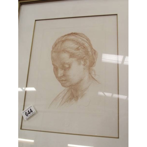 644 - A framed and glazed print of a girls head Musee De Louvre