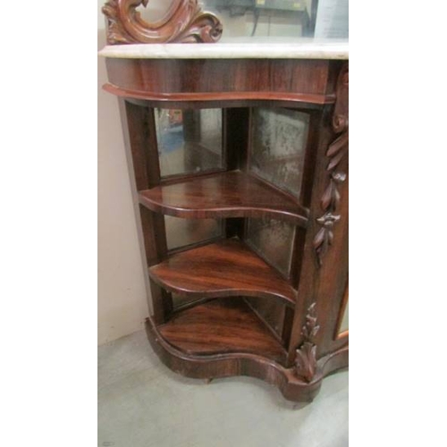 1595 - A Victorian mahogany credenza with marble top and mirror back.