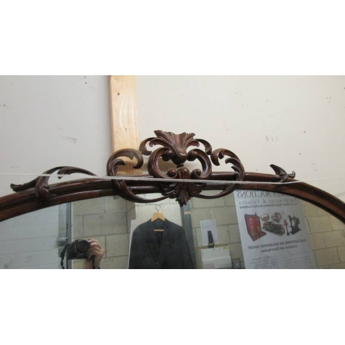 1595 - A Victorian mahogany credenza with marble top and mirror back.