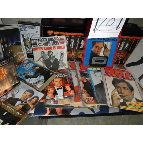 10 - One shelf of James Bond 007 pictures, magazines, CD's etc.,