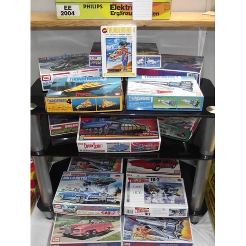 153 - 15 Japanese model kits by Bandai & Imai of Thunderbirds, Captain Scarlett etc.