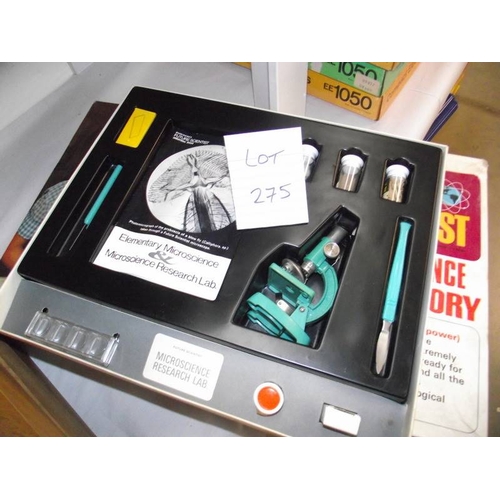 275 - 2 Waddingtons future scientist series micro science lab kits, microscopes present but some component... 