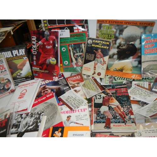 66 - A large mixed lot of football memorabilia, books, magazines etc.,
