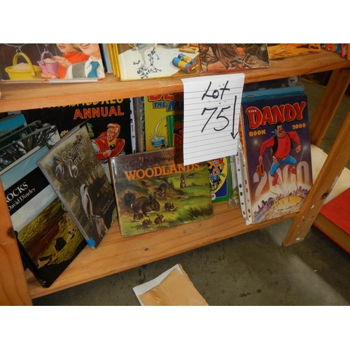 75 - An interesting shelf of books and annuals including Dandy, Common Birds, Woodlands etc.,