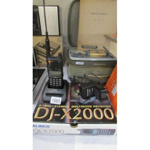 1065 - A boxed Alinco DJ-X 2000 multi band receiver with mains lead and fast charger, in working order.