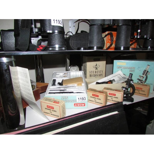 1193 - 4 boxed and one unboxed microscopes with extra specimen slides.