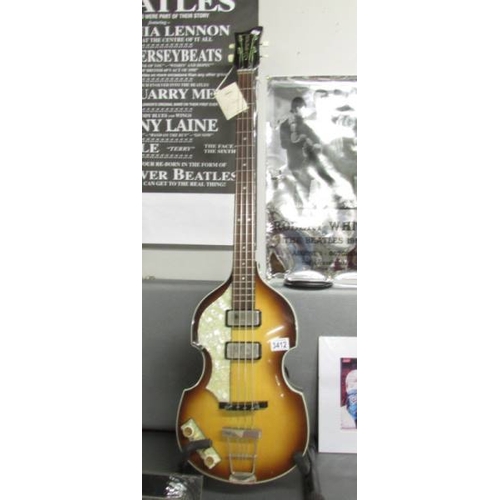 3412 - A left handed Hofner ''Beatle Bass'' guitar with original hard case (new old stock).