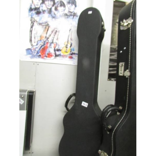 3412 - A left handed Hofner ''Beatle Bass'' guitar with original hard case (new old stock).