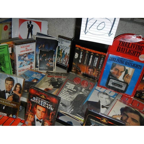 10 - One shelf of James Bond 007 pictures, magazines, CD's etc.,