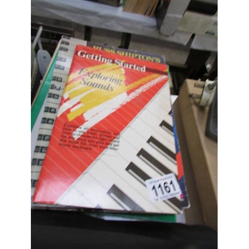 1161 - A good selection of guitar and keyboard books and some sheet music.