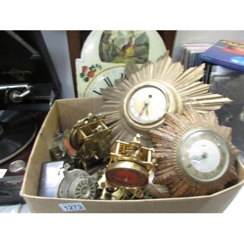 1273 - A large quantity of clock parts, empty case, faces and 2 starburst clocks, all a/f