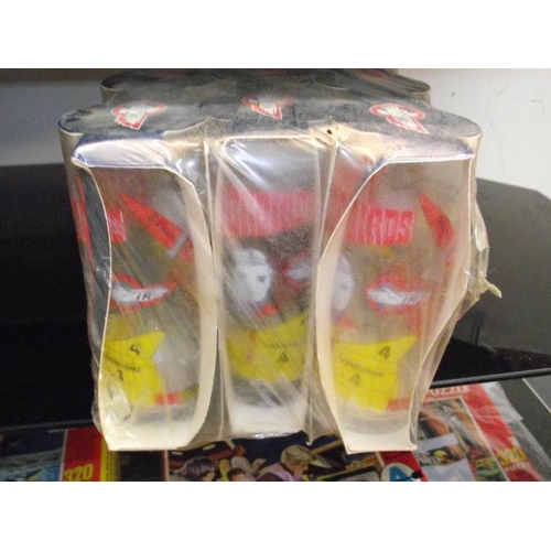 130 - 9 vintage Thunderbirds drinking glasses, still sealed in pack